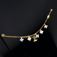 [Aethel]LOGO 6 MOTIF STAR AND SUN GOLD BRACELET